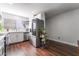Modern kitchen with stainless steel appliances and wood floors at 3585 Arville St # 402C, Las Vegas, NV 89103