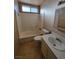 Clean bathroom with a bathtub, toilet, and vanity at 4079 E Saint Louis Ave, Las Vegas, NV 89104