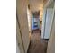 Clean hallway with carpeted floor and access to other rooms at 4079 E Saint Louis Ave, Las Vegas, NV 89104