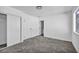 Well-lit bedroom with carpet flooring and a large closet at 408 Pecos Way, Las Vegas, NV 89121