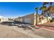 Row of garages with white doors at 408 Pecos Way, Las Vegas, NV 89121