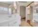 Bathroom features double sinks and mirrored closet at 4504 Inez Dr, Las Vegas, NV 89130