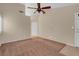 Spacious bedroom with carpet and door to bathroom at 4504 Inez Dr, Las Vegas, NV 89130