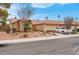 Single-story house with a two-car garage and landscaped front yard at 4504 Inez Dr, Las Vegas, NV 89130