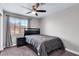 Cozy bedroom with a double bed, nightstand, and ceiling fan at 4726 Beaconsfield St, Las Vegas, NV 89147