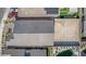Aerial view of the home showing the roof and the blank canvas of the large backyard at 6524 Summershade St, North Las Vegas, NV 89086