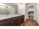 The bathroom includes a double sink vanity, a walk-in shower, and closet access at 6524 Summershade St, North Las Vegas, NV 89086