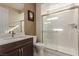 Bathroom vanity sink with walk in shower at 6524 Summershade St, North Las Vegas, NV 89086