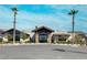 Beautiful community clubhouse with well manicured landscaping, stone accents, and modern architecture at 6524 Summershade St, North Las Vegas, NV 89086