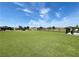 Expansive dog park with well-maintained turf, secure fencing, and ample space for pets to roam and play at 6524 Summershade St, North Las Vegas, NV 89086