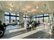 Modern gym featuring fitness equipment, floor to ceiling windows and views of the community at 6524 Summershade St, North Las Vegas, NV 89086