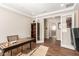 Home office featuring French doors, wood floors, and natural light, perfect for a productive workspace at 6524 Summershade St, North Las Vegas, NV 89086