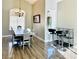 Dining room with hardwood floors and chandelier at 6538 W Mesa Vista Ave, Las Vegas, NV 89118