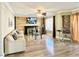 Living room with stone fireplace and hardwood floors at 6538 W Mesa Vista Ave, Las Vegas, NV 89118