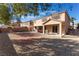 Large backyard with covered patio and play area at 6916 Snow Finch St, North Las Vegas, NV 89084