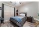 Charming bedroom with a full bed and window seating at 6916 Snow Finch St, North Las Vegas, NV 89084