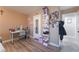 Bright bedroom with wood floors and built-in shelving at 6916 Snow Finch St, North Las Vegas, NV 89084
