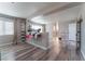 Well-lit bedroom with built-in shelving and an adjacent bathroom at 6916 Snow Finch St, North Las Vegas, NV 89084