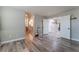 Spacious bedroom with wood-look floors and an ensuite bathroom at 6916 Snow Finch St, North Las Vegas, NV 89084