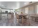 Kitchen features white cabinets, granite countertops, and a breakfast nook at 6916 Snow Finch St, North Las Vegas, NV 89084