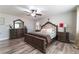 Bright main bedroom featuring a king-size bed and ensuite bath at 6916 Snow Finch St, North Las Vegas, NV 89084