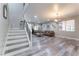 Elegant staircase with wrought iron railing and white risers at 6916 Snow Finch St, North Las Vegas, NV 89084