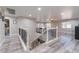 Upstairs hall with railing overlooking the living area at 6916 Snow Finch St, North Las Vegas, NV 89084
