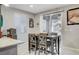 Cozy dining area with table and chairs, adjacent to the kitchen at 710 Bamboo Bend Pl, Henderson, NV 89011