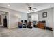 Spacious home office with a desk, chair, and ample storage at 710 Bamboo Bend Pl, Henderson, NV 89011