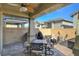 Covered patio with seating area and ceiling fan at 710 Bamboo Bend Pl, Henderson, NV 89011