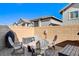 Cozy patio with fire pit and seating for relaxation at 710 Bamboo Bend Pl, Henderson, NV 89011