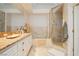 Bright bathroom with double vanity, shower, and soaking tub at 7943 Harbour Towne Ave, Las Vegas, NV 89113