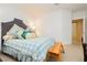 Bright bedroom with a bed and plenty of space at 7943 Harbour Towne Ave, Las Vegas, NV 89113