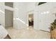 Bright entryway with tile flooring and view to living room at 7943 Harbour Towne Ave, Las Vegas, NV 89113