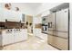 Stainless steel appliances and granite countertops in this kitchen at 7943 Harbour Towne Ave, Las Vegas, NV 89113