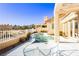 Inviting pool area with patio furniture and a view at 7943 Harbour Towne Ave, Las Vegas, NV 89113