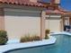 Outdoor living includes backyard pool with automatic security shutters to keep your Gathering safe at 7943 Harbour Towne Ave, Las Vegas, NV 89113