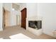 Fireplace in Primary bedroom with large mirror and wooden cabinet at 7943 Harbour Towne Ave, Las Vegas, NV 89113