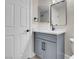 Clean bathroom with gray vanity and marble countertop at 8232 Ocean Terrace Way, Las Vegas, NV 89128