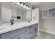 Modern bathroom with double vanity and marble countertops at 8232 Ocean Terrace Way, Las Vegas, NV 89128