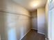 Large walk-in closet with wire shelving and carpeted flooring at 968 Lucky Bamboo Dr, Henderson, NV 89052