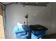 Garage with trash and recycling bins at 10264 Headrick Dr, Las Vegas, NV 89166