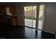 Kitchen with sliding glass door to backyard at 10264 Headrick Dr, Las Vegas, NV 89166