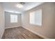 Bright bedroom with wood-look flooring at 10823 Crestview Pointe Ave, Las Vegas, NV 89166