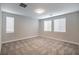 Bright bedroom with neutral walls and carpet flooring at 10823 Crestview Pointe Ave, Las Vegas, NV 89166