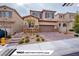 Two story house with attached garage and landscaped front yard at 10823 Crestview Pointe Ave, Las Vegas, NV 89166