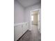 Hallway with white cabinets and grey carpeting at 10823 Crestview Pointe Ave, Las Vegas, NV 89166