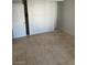 Bedroom with tile floors and mirrored closet doors at 1405 Vegas Valley Dr # 398, Las Vegas, NV 89169