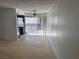 Bright living room featuring tile flooring and a sliding glass door to a balcony at 1405 Vegas Valley Dr # 398, Las Vegas, NV 89169