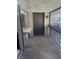 Small patio with a door and a metal railing at 1405 Vegas Valley Dr # 398, Las Vegas, NV 89169